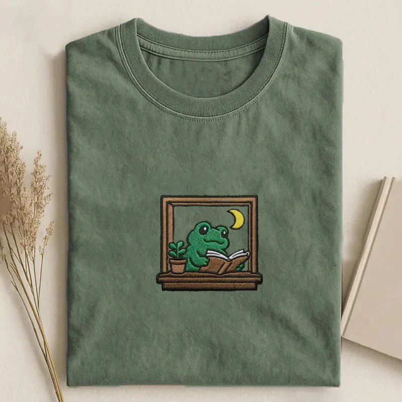 Frog Reading in Window Embroidered T-shirt